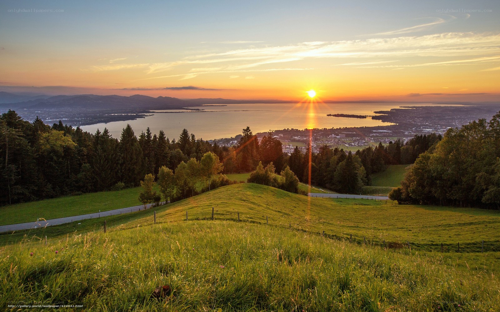 Sunset over a lake and hills