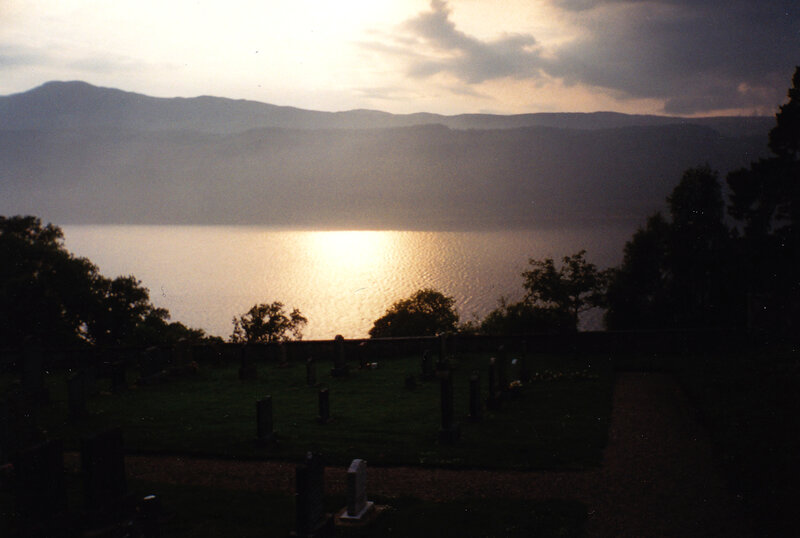 Sunset over a lake and mountains