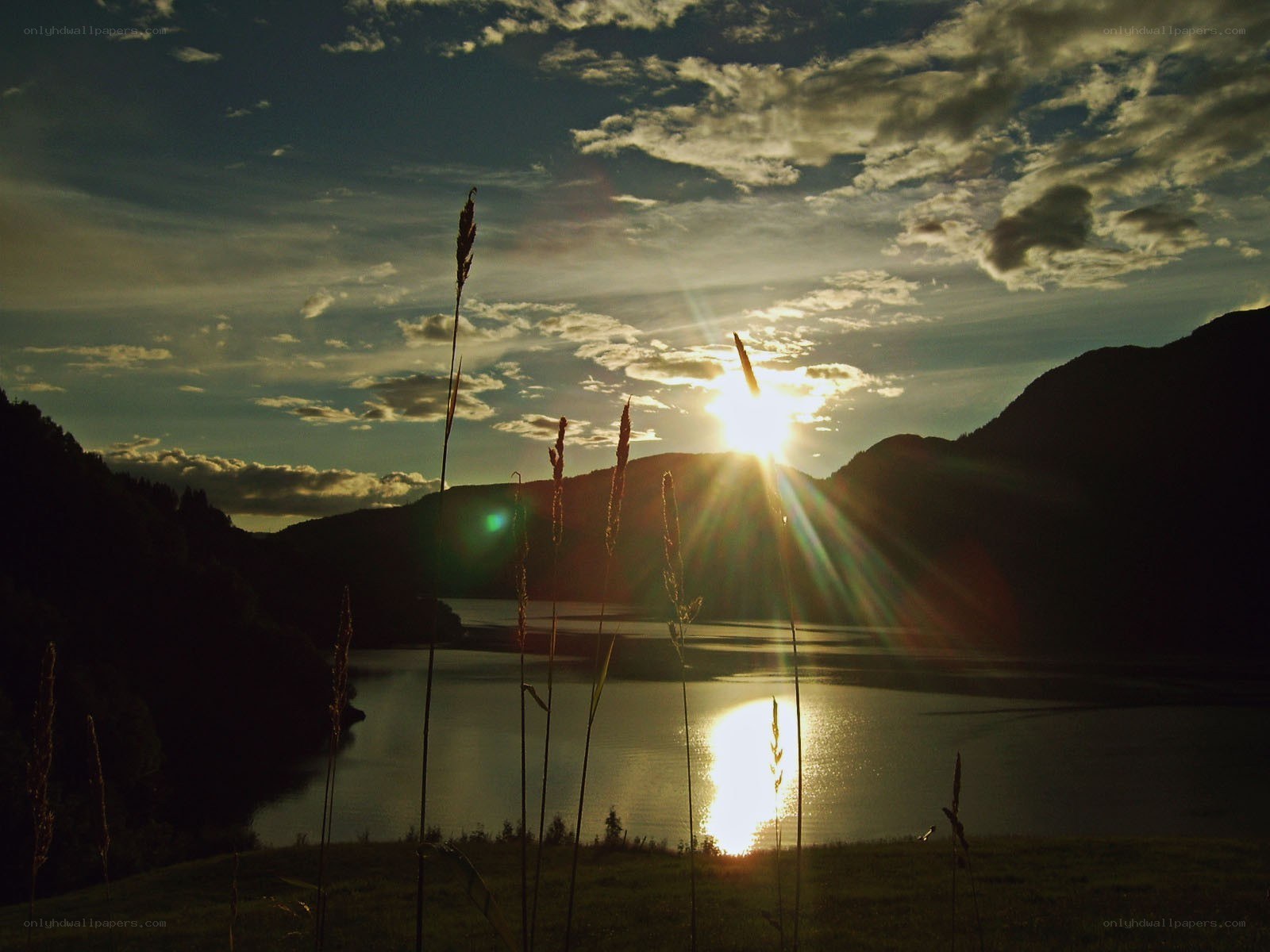 Sunset over a lake at dusk