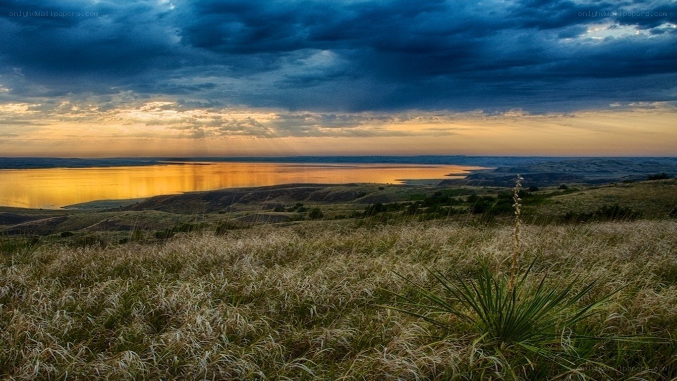Sunset over a lake at dusk