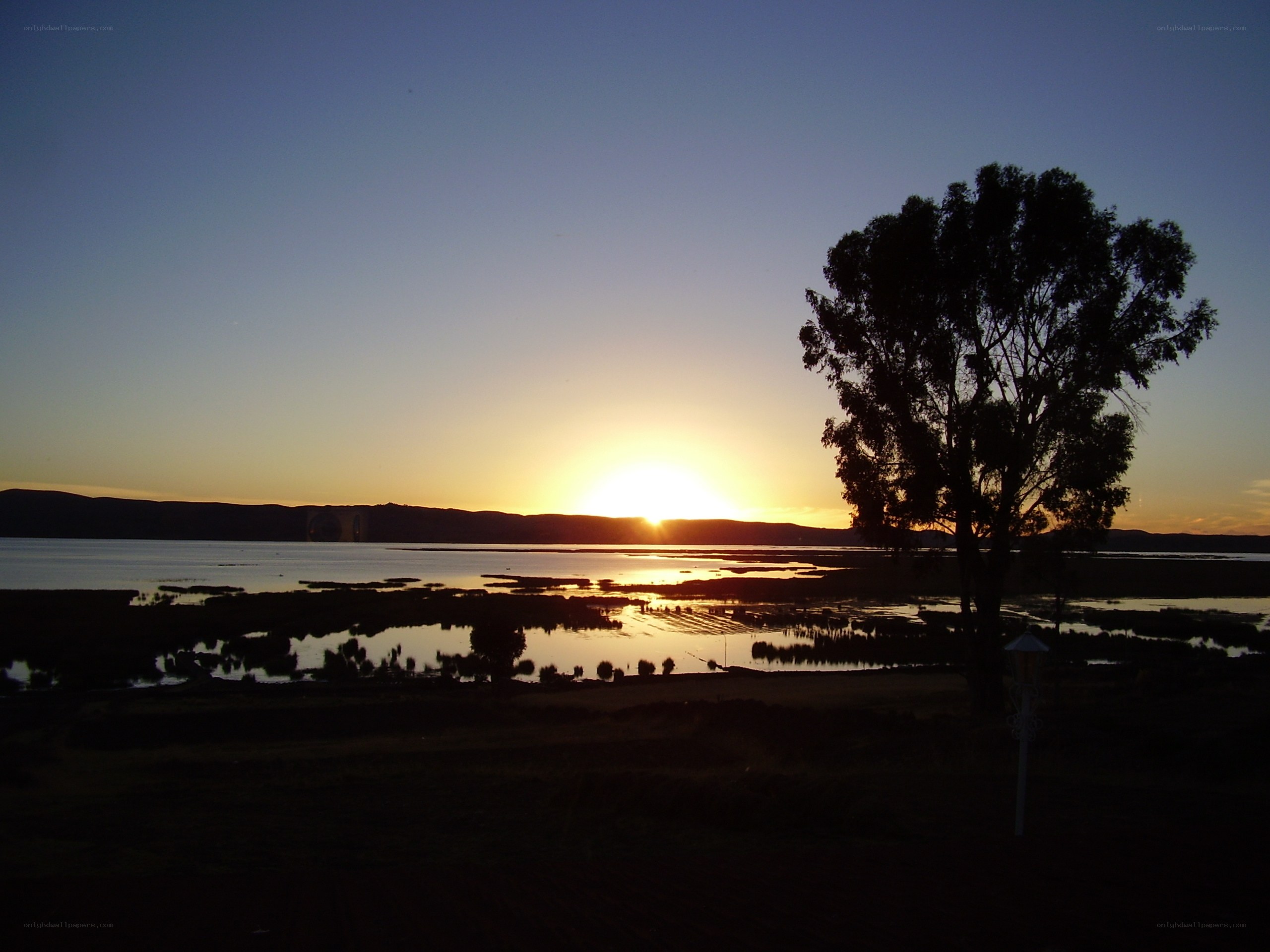 Sunset over a lake at dusk