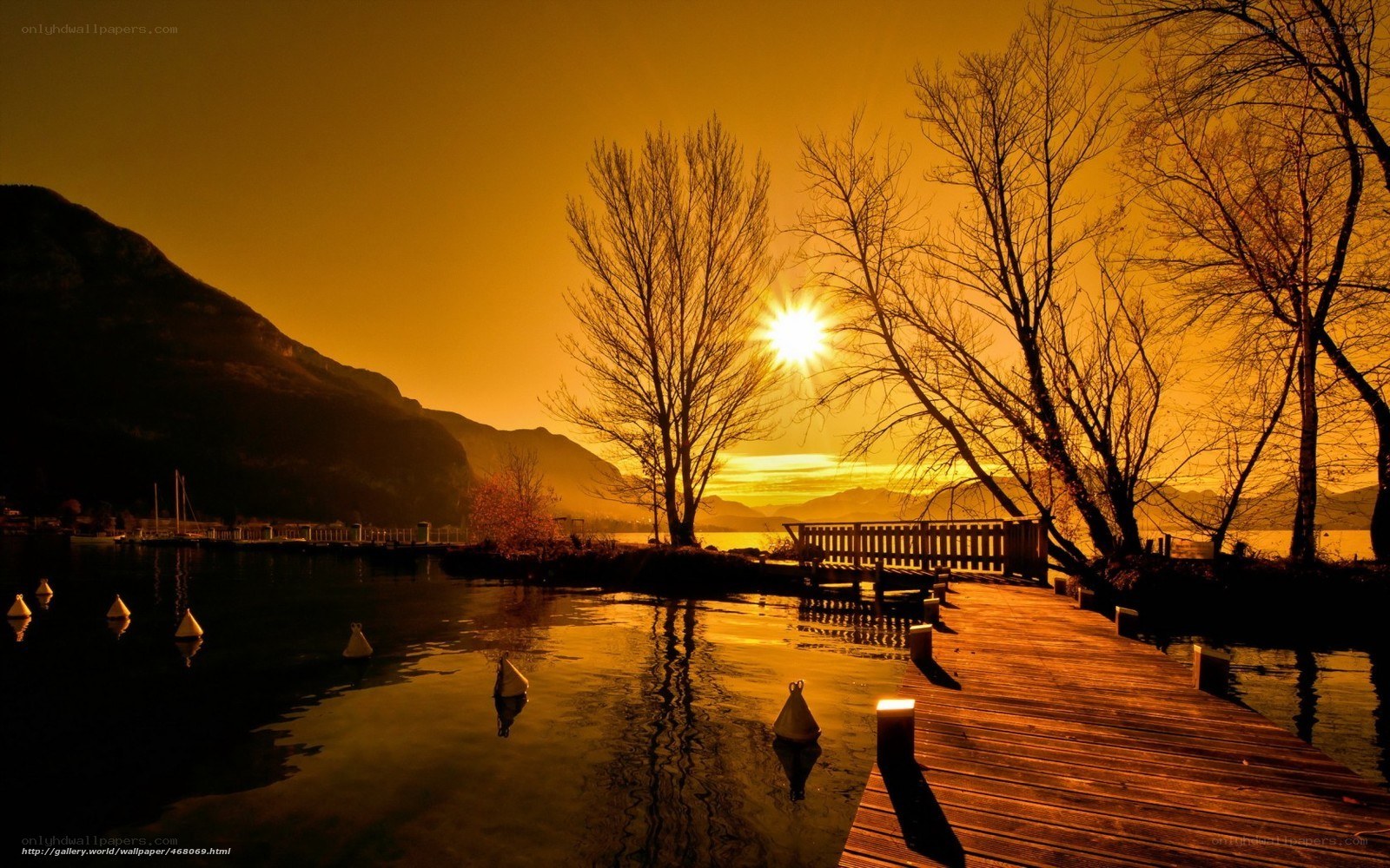 sunset over a lake dock