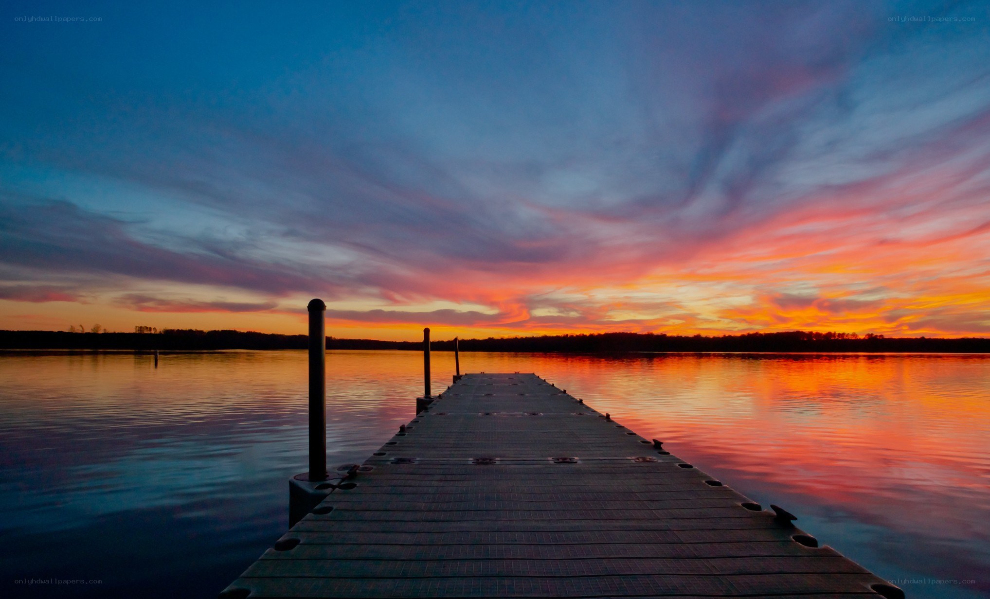 Sunset over a lake dock