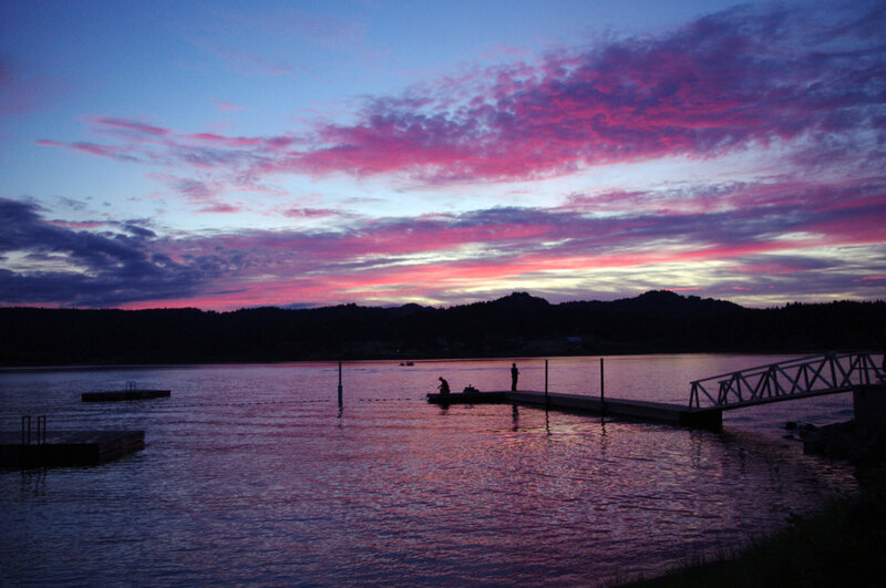Sunset over a lake with docks