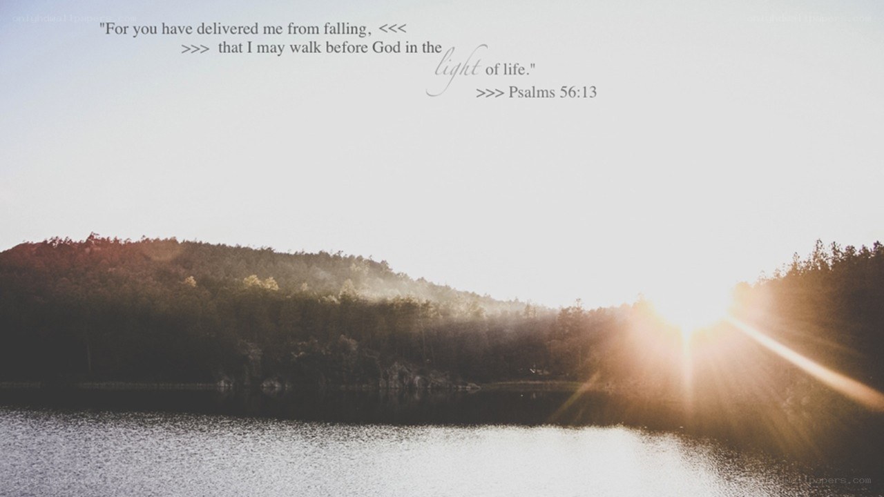 Sunset over a lake with scripture