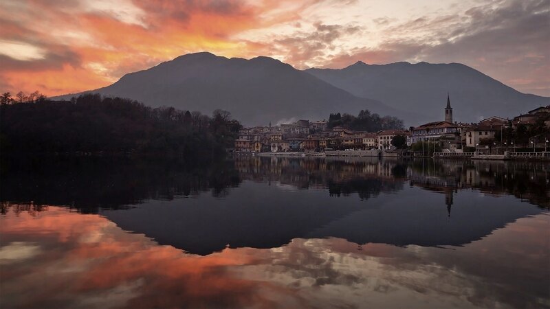 Sunset over a lakeside town