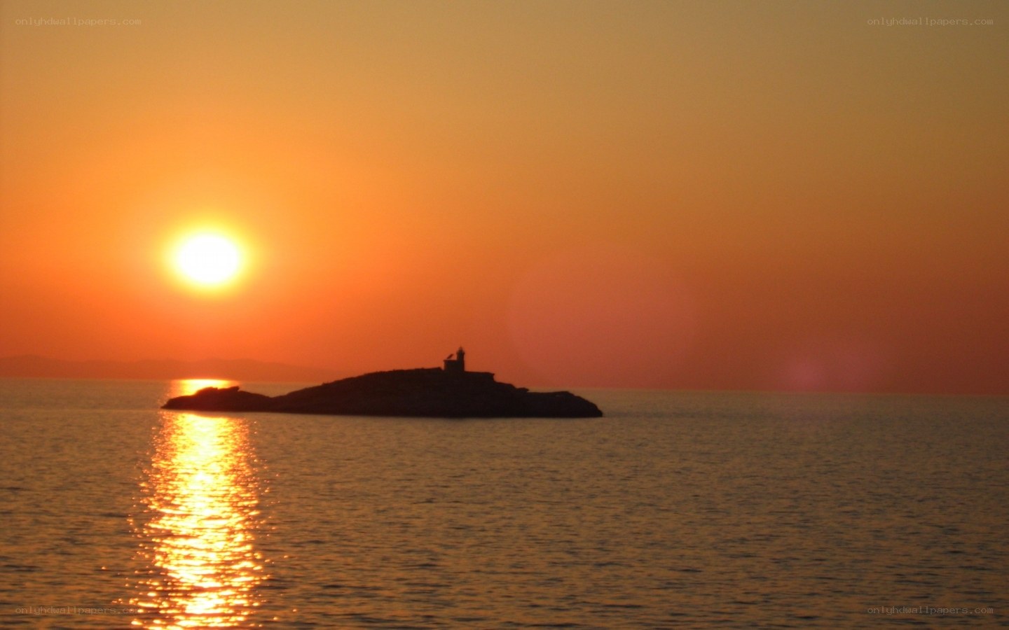 Sunset over a lighthouse island