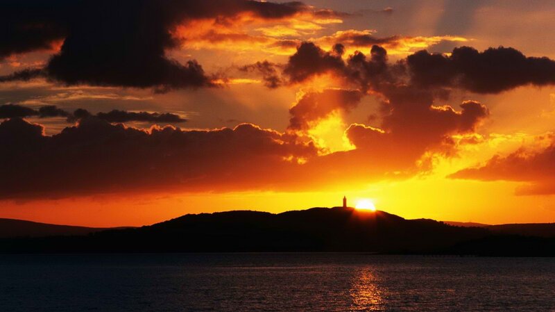 Sunset over a lighthouse