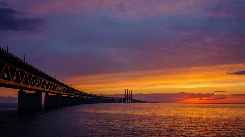 Sunset over a Long Bridge — Orange, Dramatic