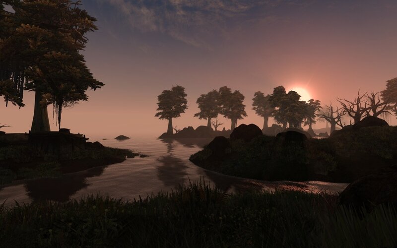 sunset over a misty river