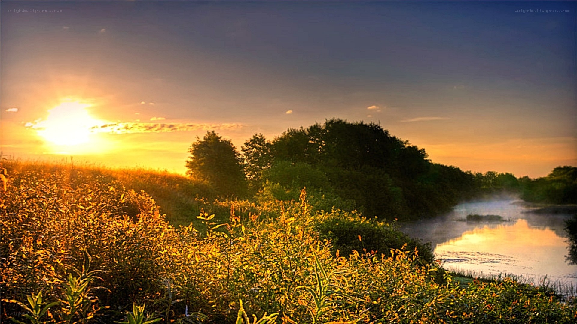 Sunset over a misty river