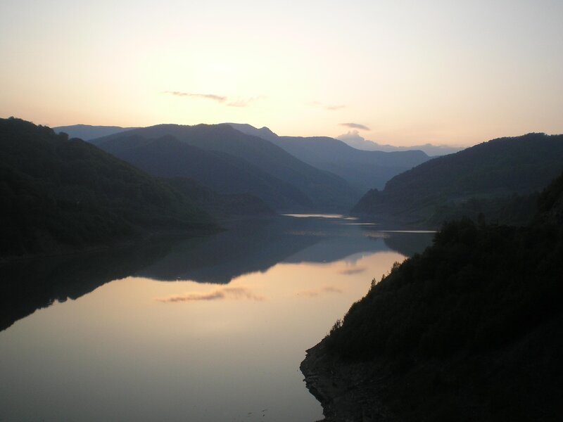 sunset over a mountain lake