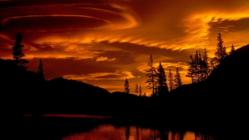 sunset over a mountain lake
