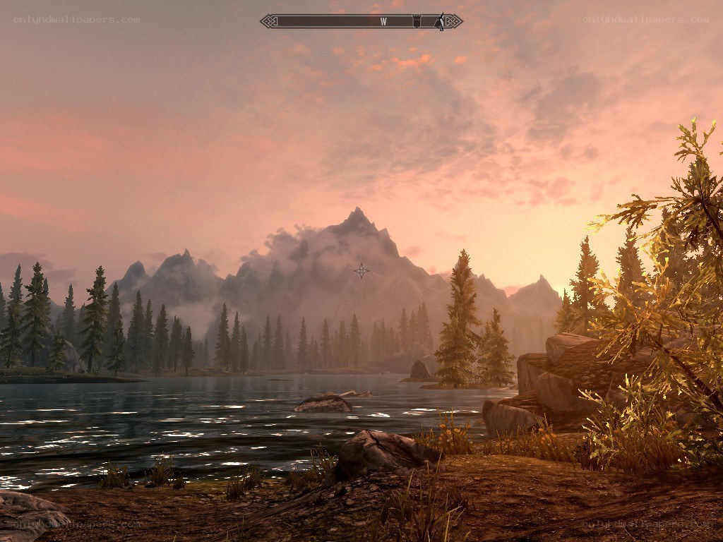 sunset over a mountain lake