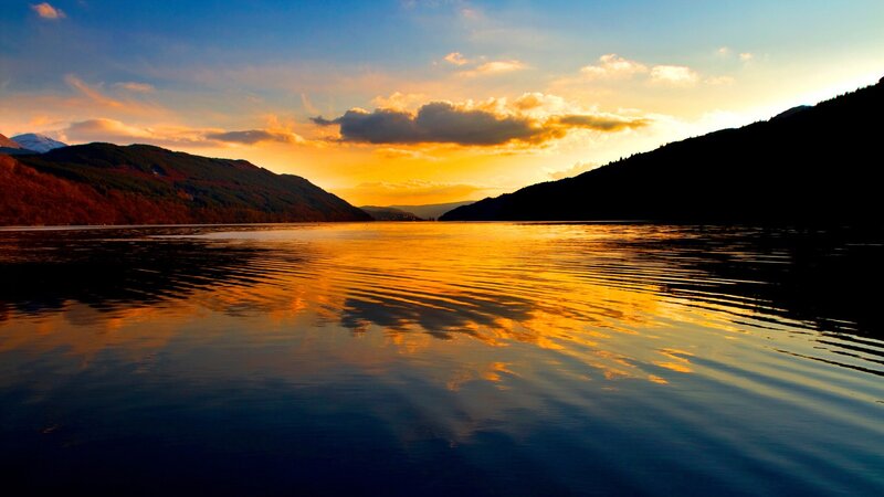 sunset over a mountain lake
