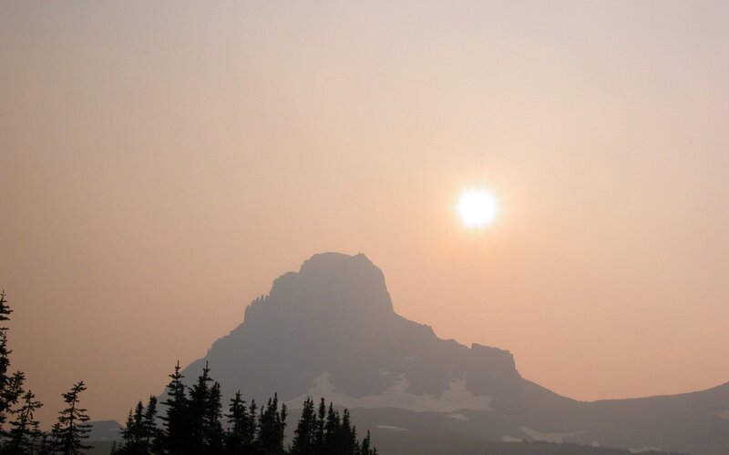 Sunset over a mountain silhouette