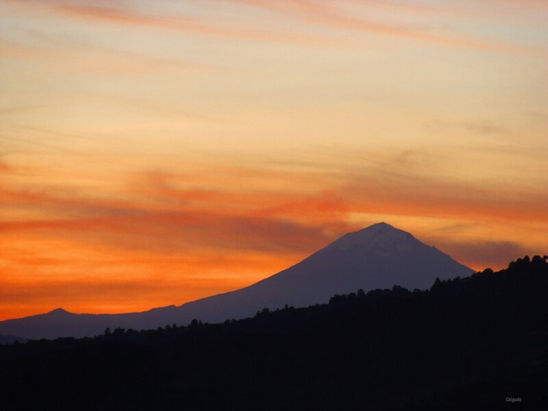 Sunset over a mountain silhouette