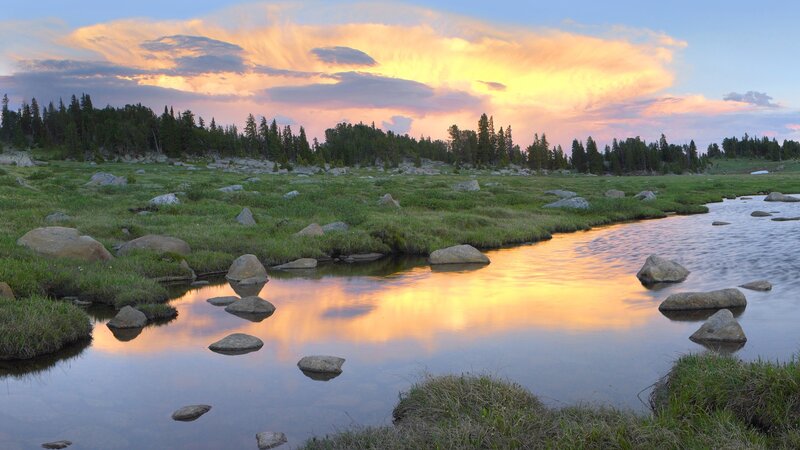 Sunset over a mountain stream