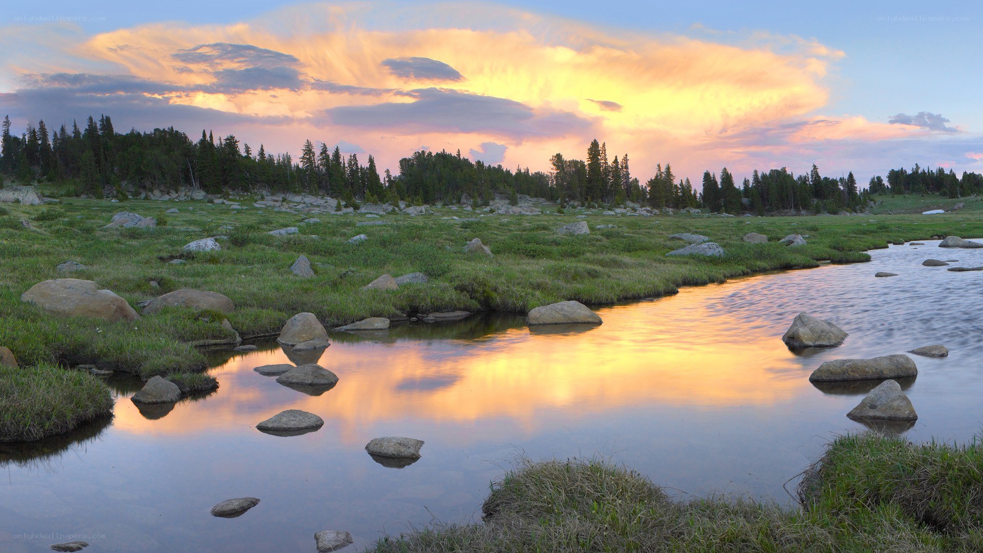 Sunset over a mountain stream