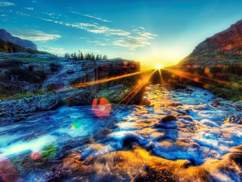 Sunset over a mountain stream