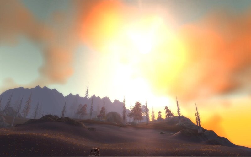sunset over a mountainous landscape