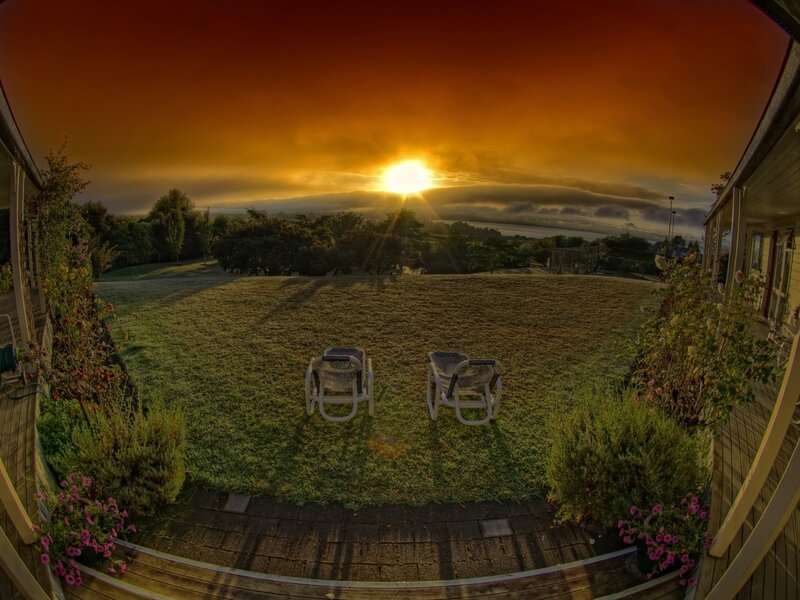Sunset over a peaceful backyard