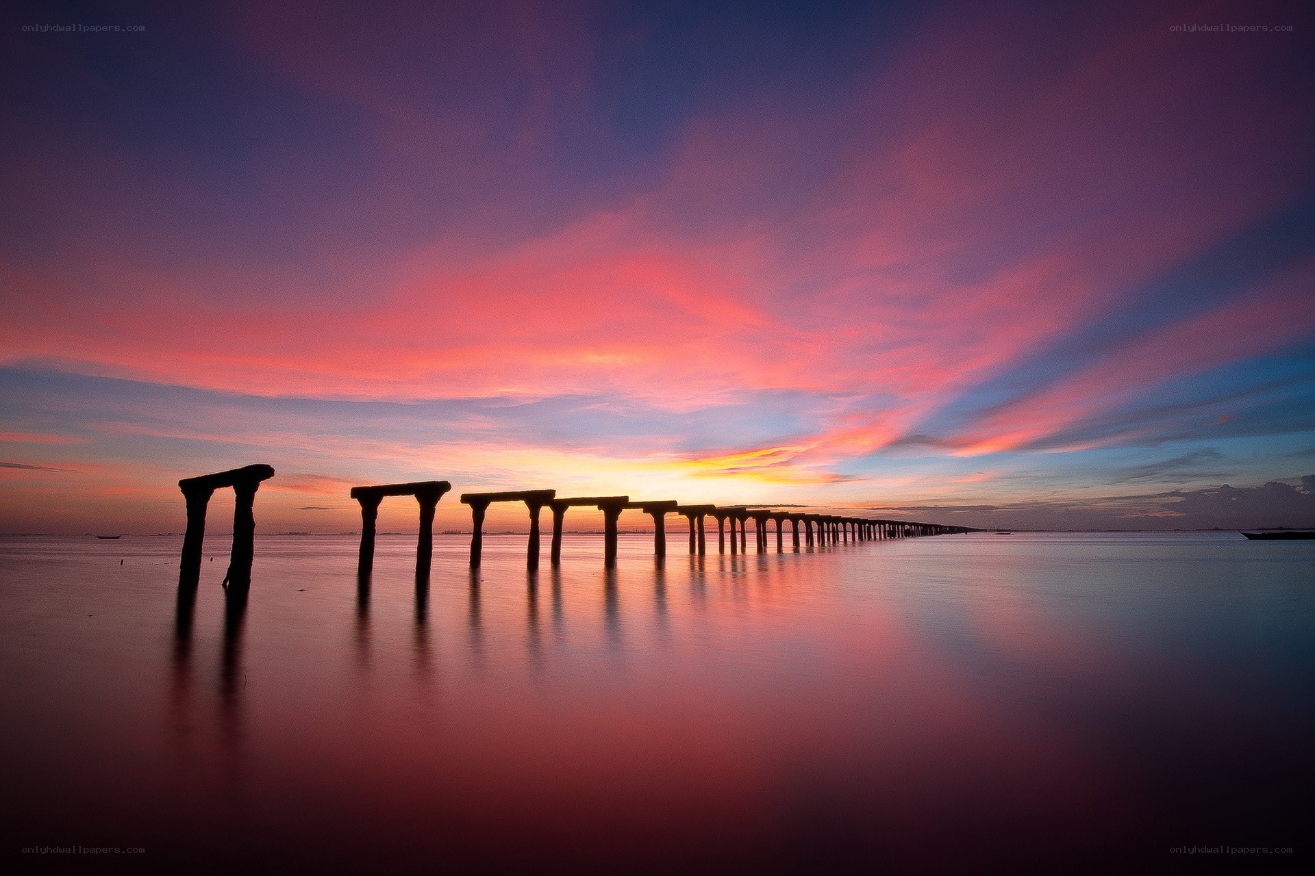 Sunset over a pier