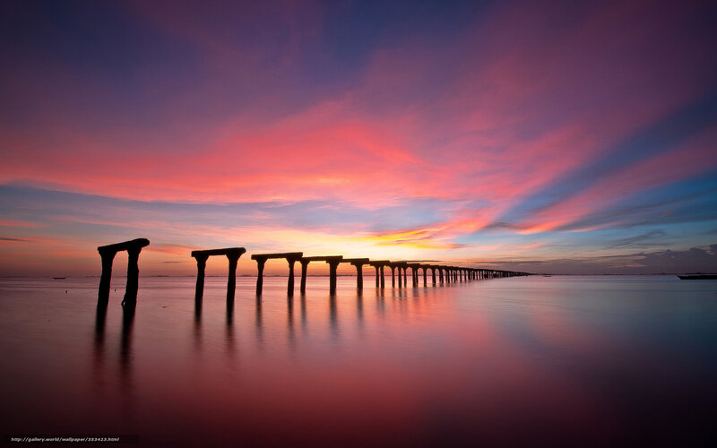Sunset over a pier