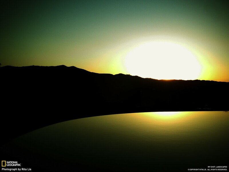 Sunset over a pool