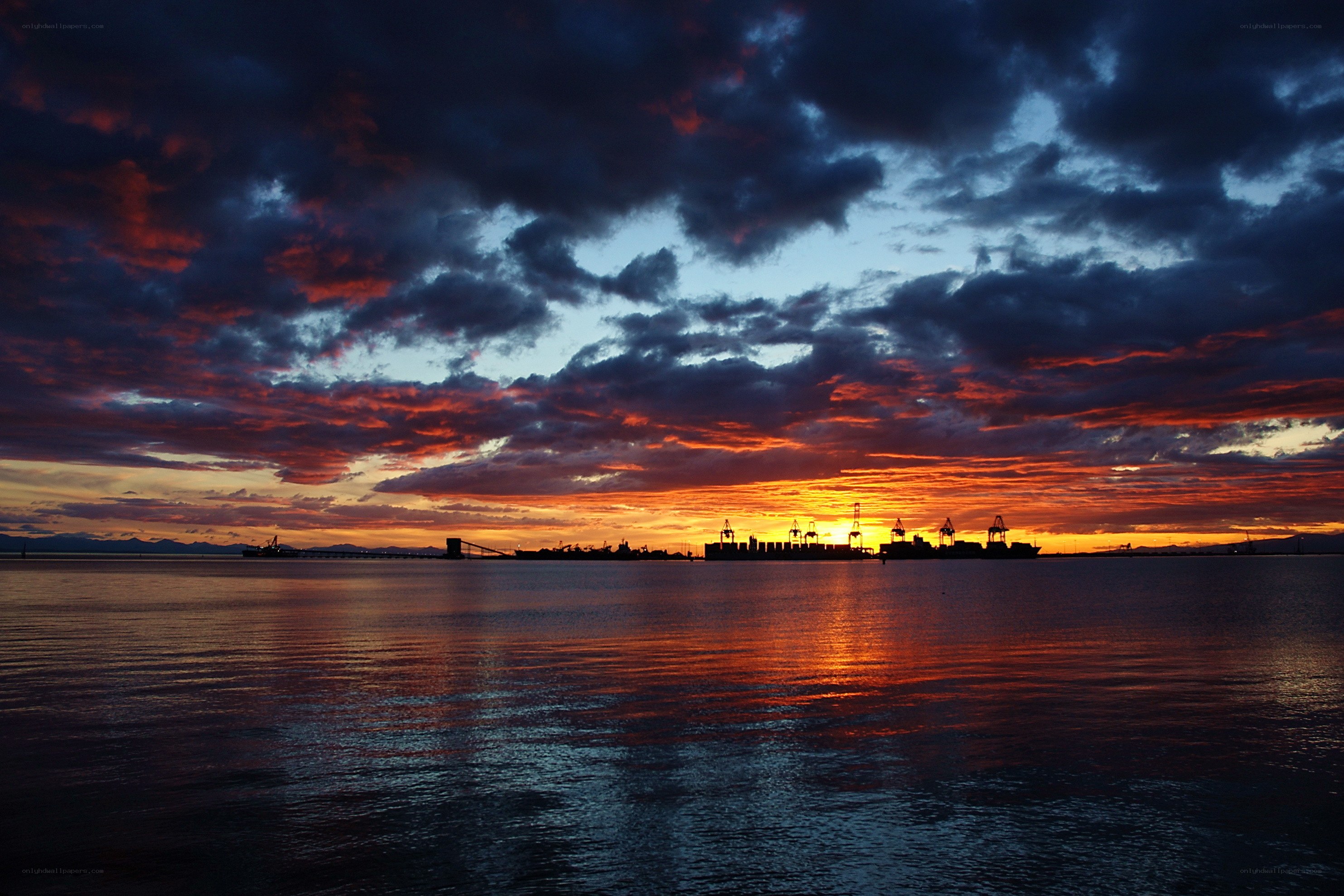 Sunset over a port