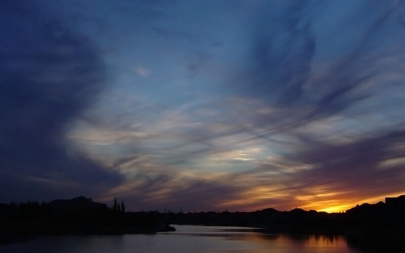 sunset over a quiet lake