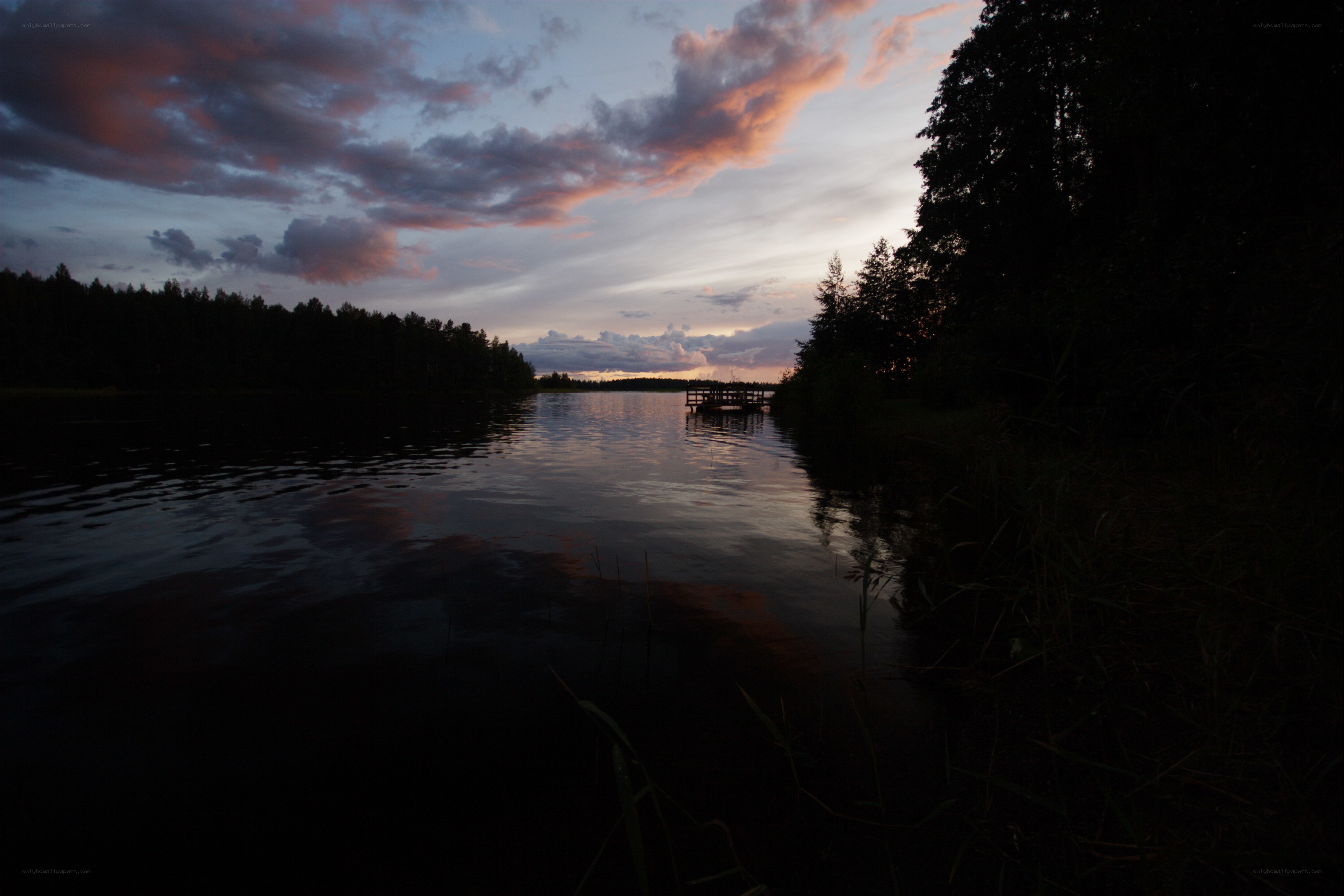 sunset over a quiet lake