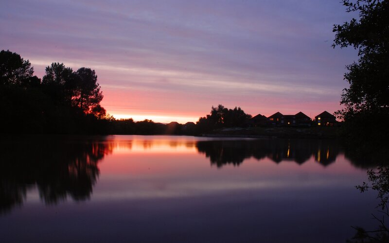 sunset over a quiet lake