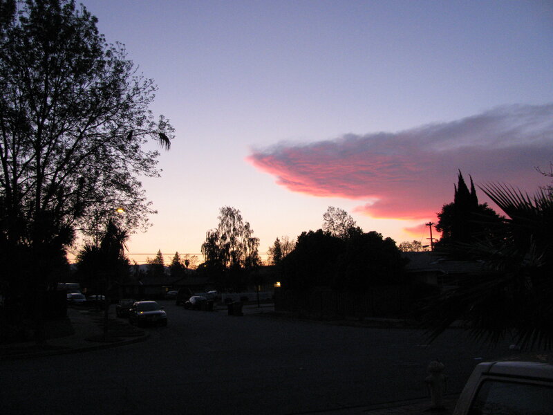 sunset over a quiet neighborhood