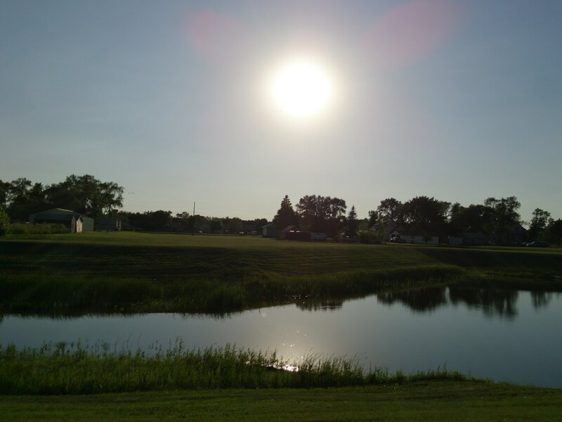 Sunset over a quiet pond