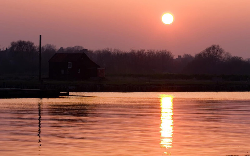 Sunset over a quiet river