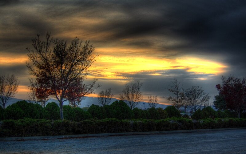 Sunset over a quiet road