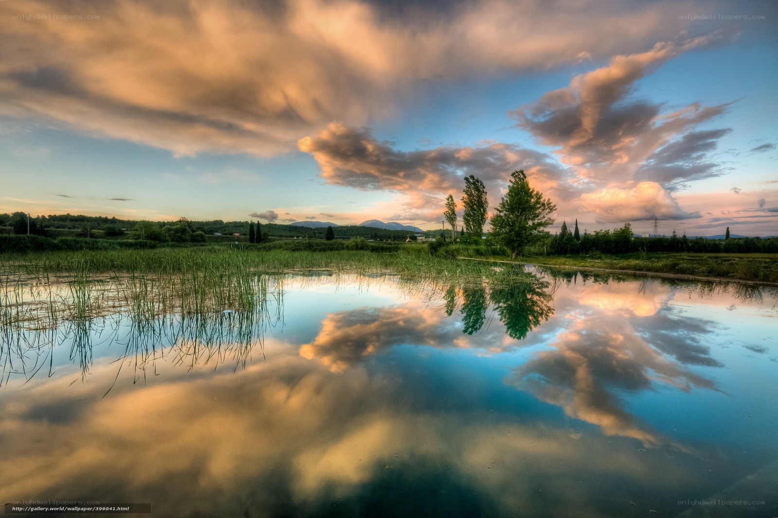 Sunset over a reflective pond