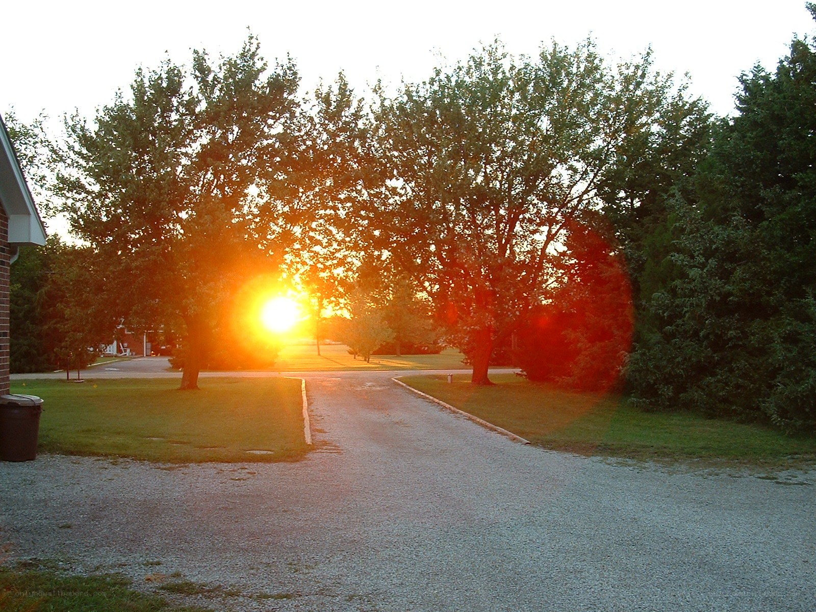 Sunset over a residential driveway