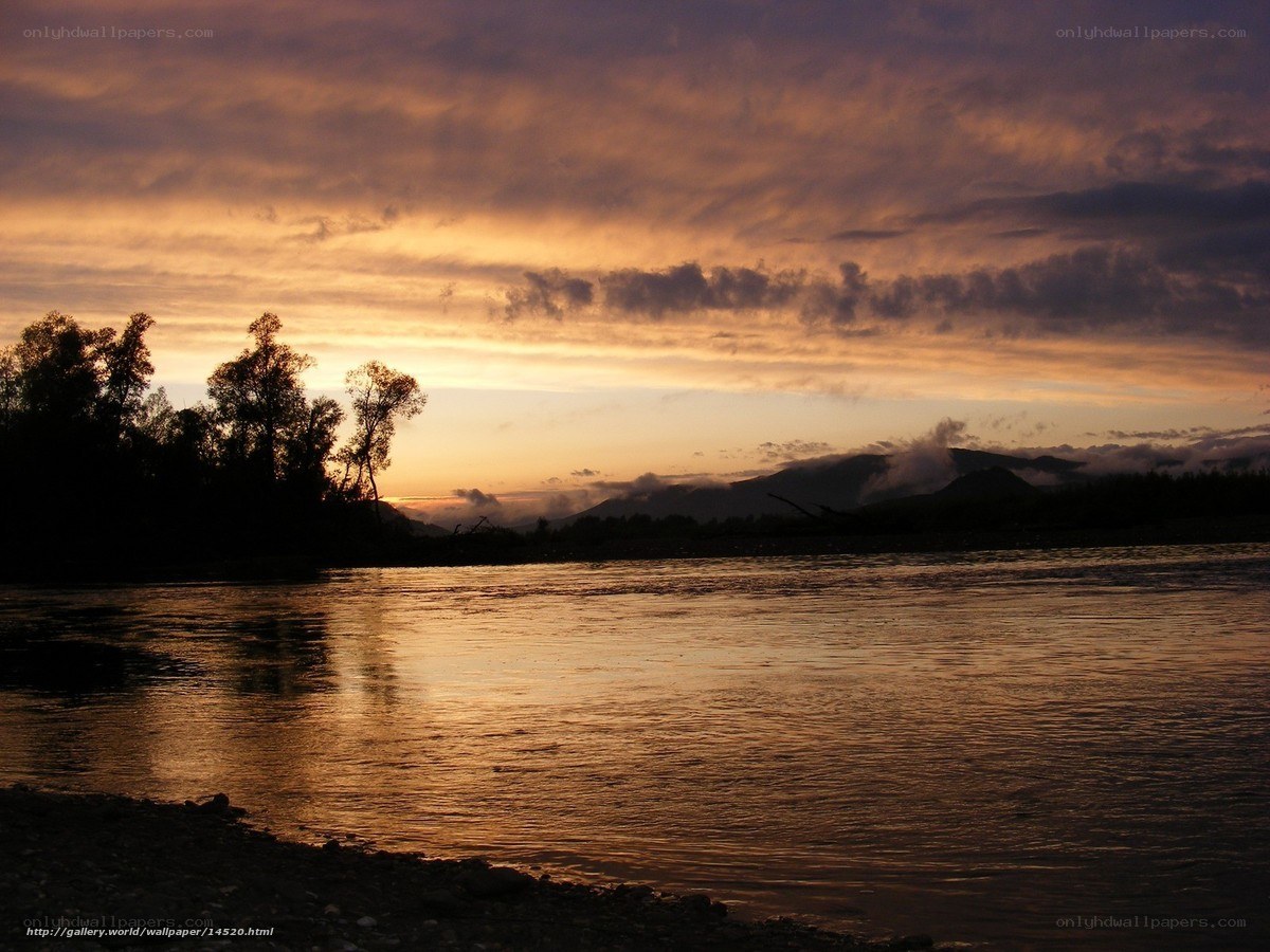 Sunset over a river at dusk