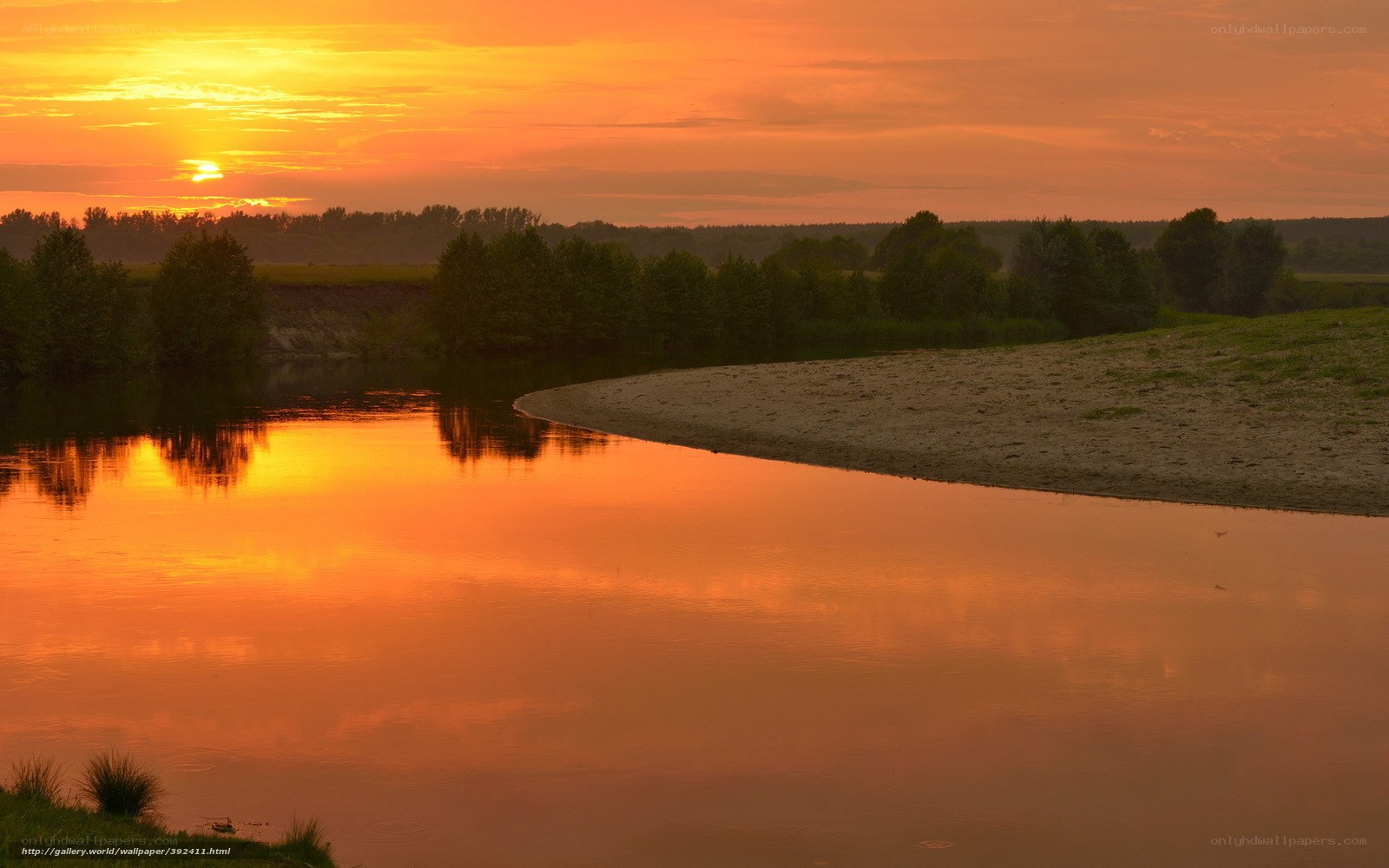 Sunset over a river bend