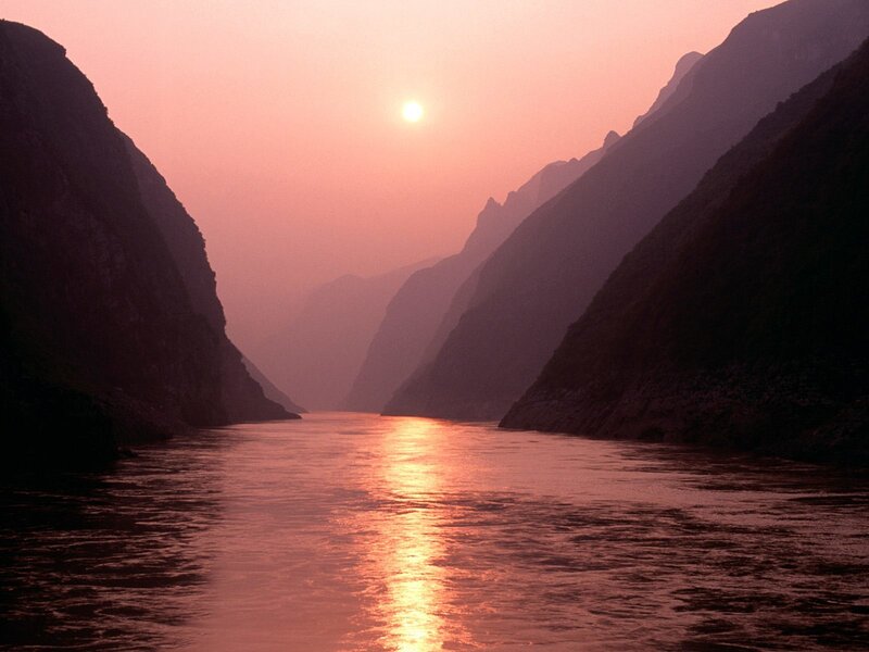 Sunset over a river canyon