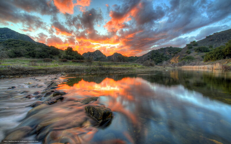 Sunset over a river canyon