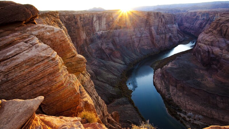 Sunset over a river canyon