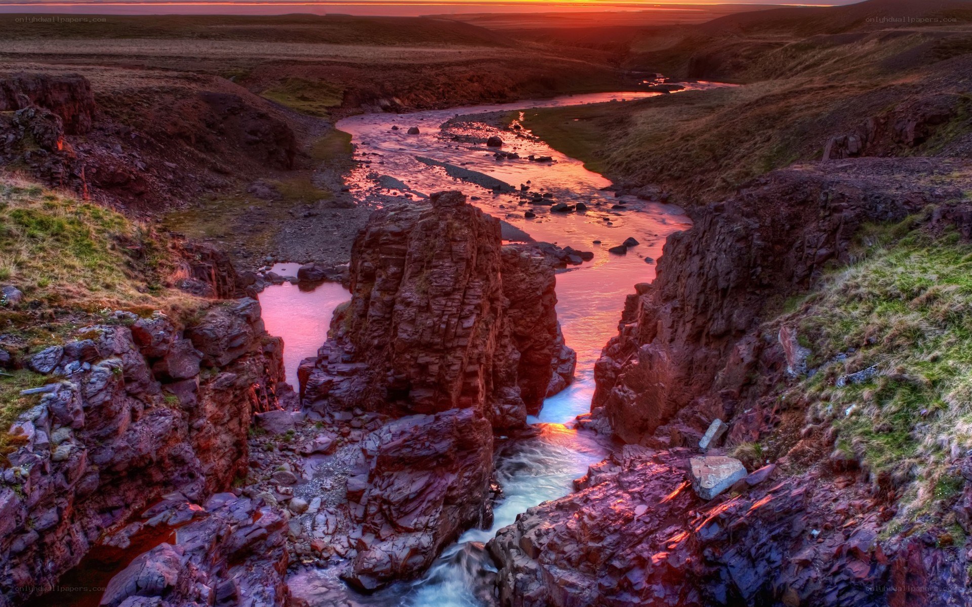 Sunset over a river canyon