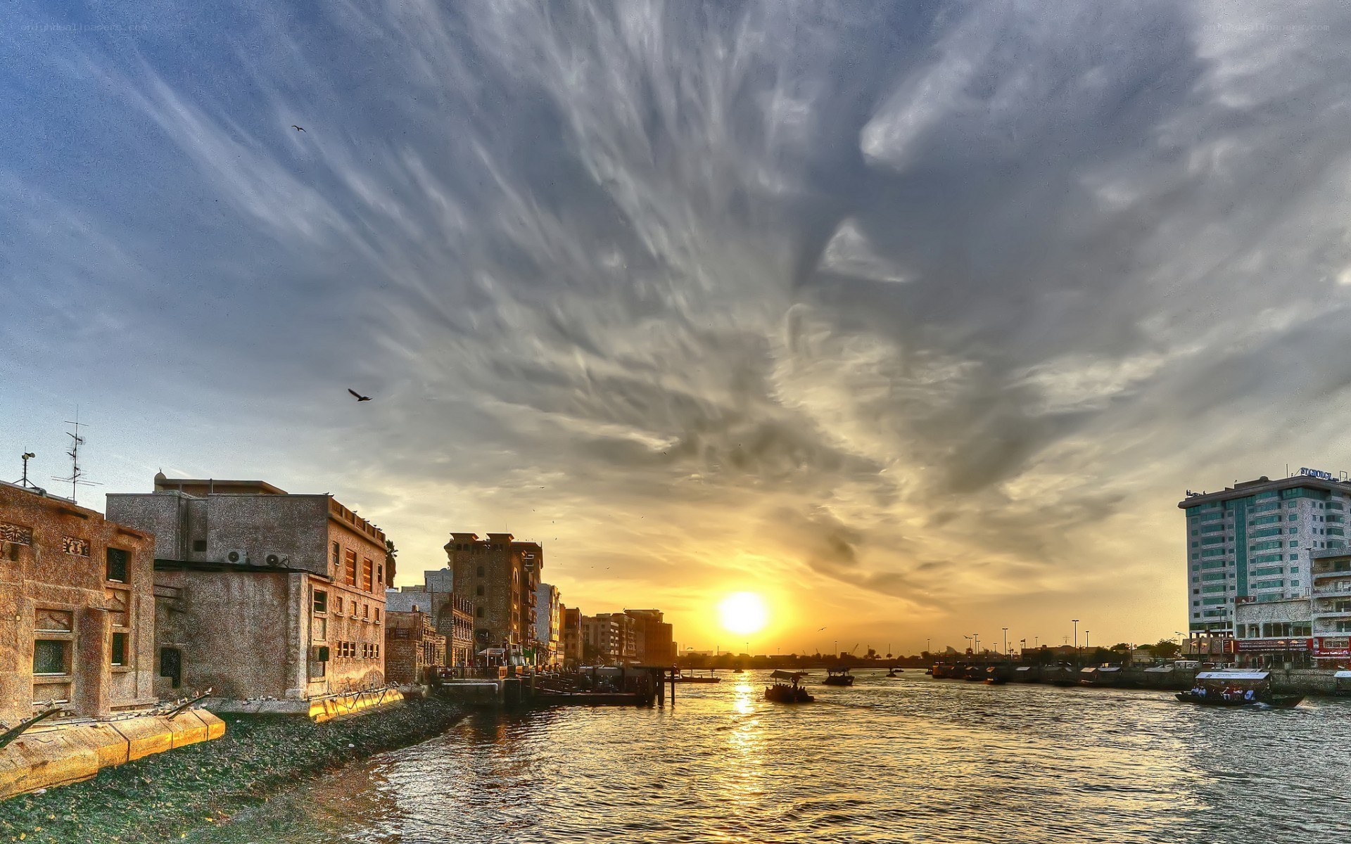 Sunset over a river city