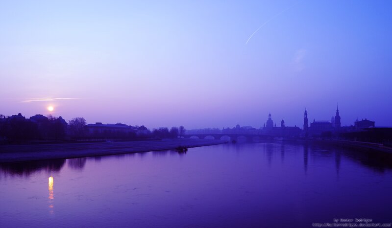 Sunset over a river city