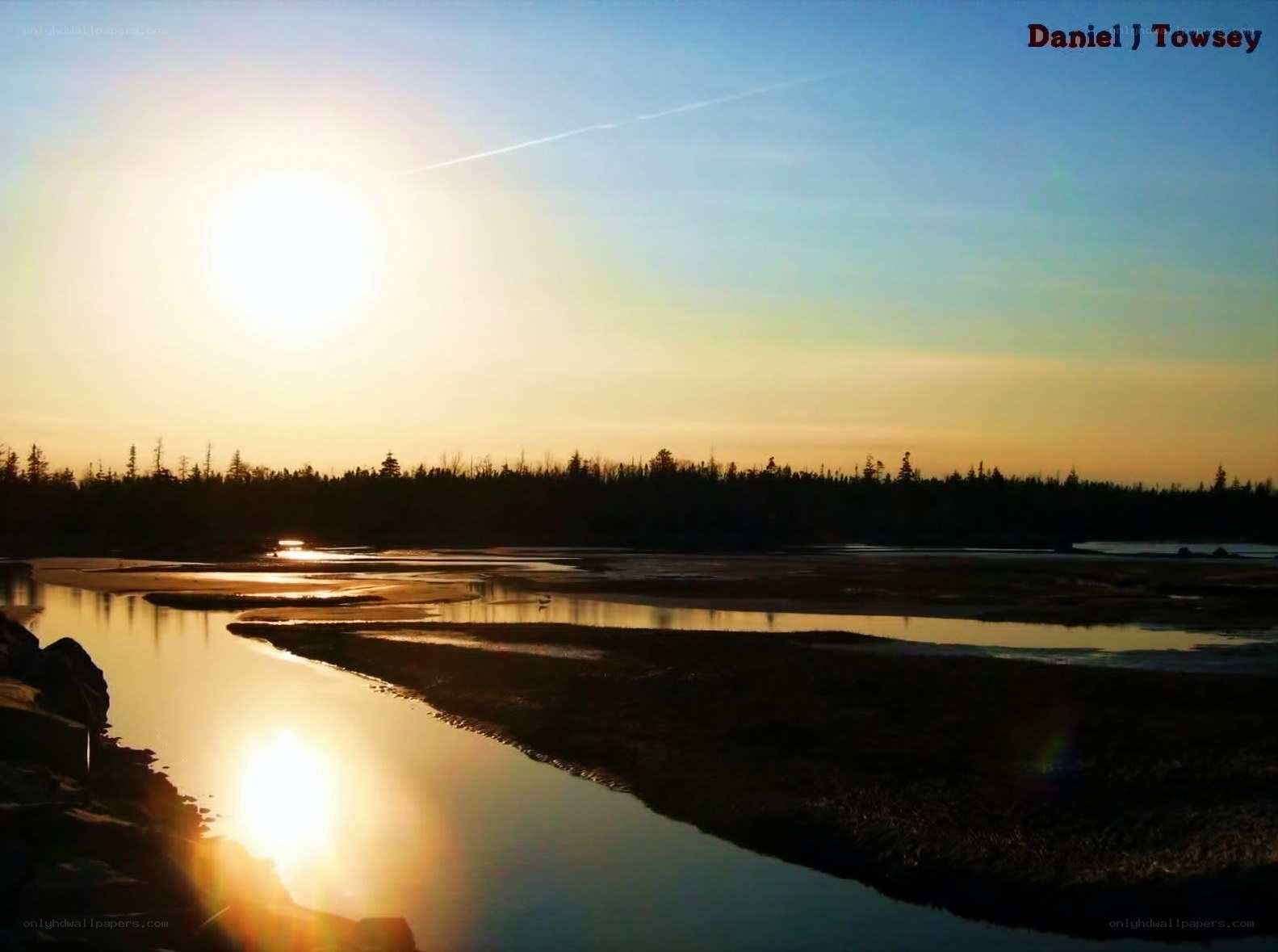 Sunset over a river delta