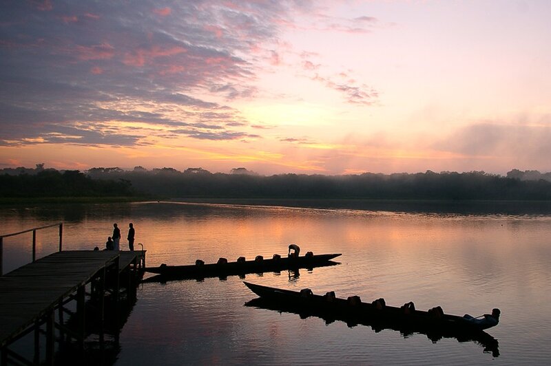 Sunset over a river dock