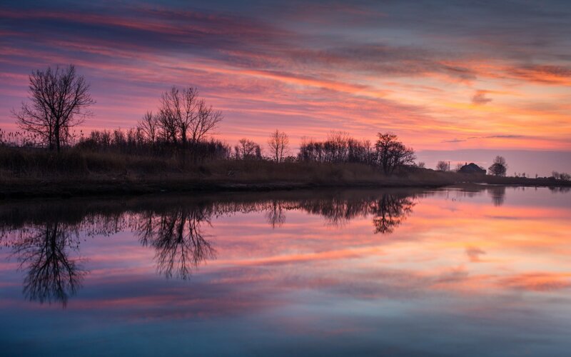 Sunset over a River — Pink